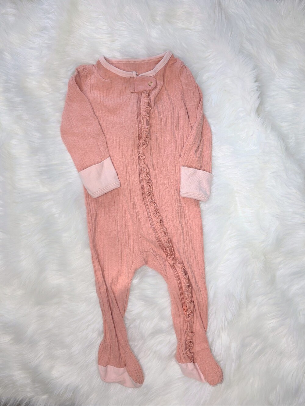 Sweet dusty pink/coral Cloud Island footed sleeper in size 6–9 months.